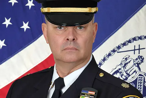 The NYPD's commanding officer of the 108 Precinct in Queens, Deputy Inspector Michael Gibbs.